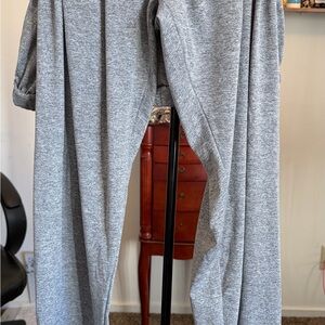 3xl Plus Size Gray Leggings with With Embroidery at the bottom.